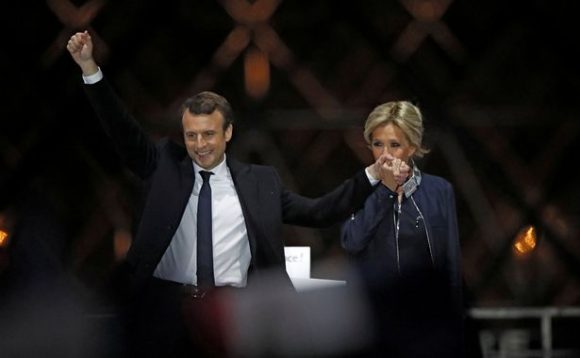 FILE-PHOTO-French-President-elect-Emmanuel-Macron-and-his-wife-Brigitte-Trogneux-celebrate-on-the-s