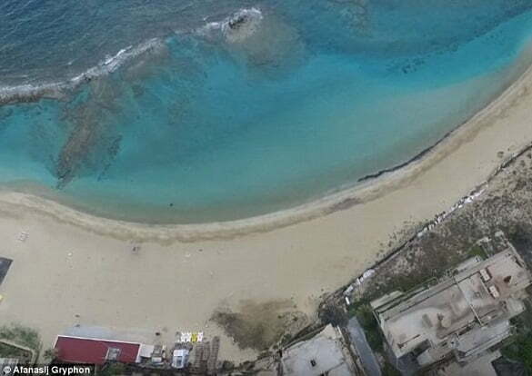 Varosha's untouched beach and crystal-clear waters of the Mediterranean Sea look as inviting as ever in the rare drone footage